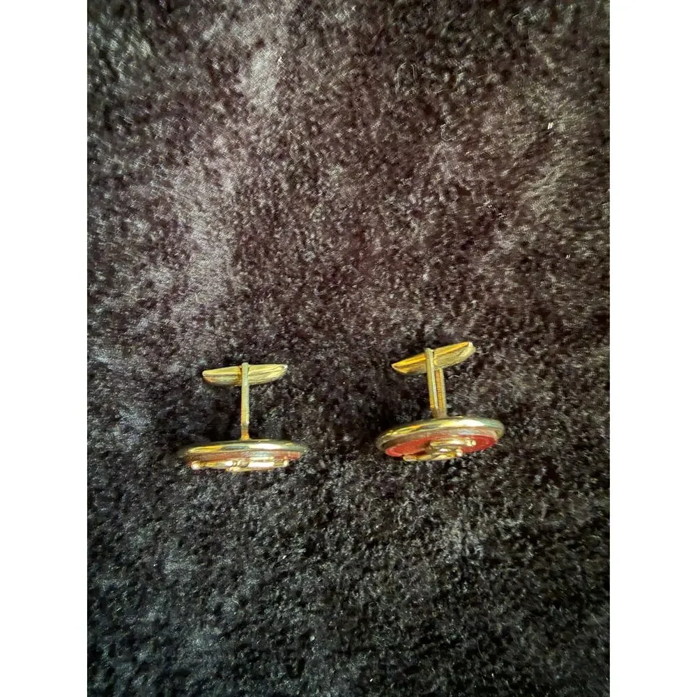 Vtg MCM Gold Tone Burgundy Monogram L?/Stylized Skier? Cufflinks
